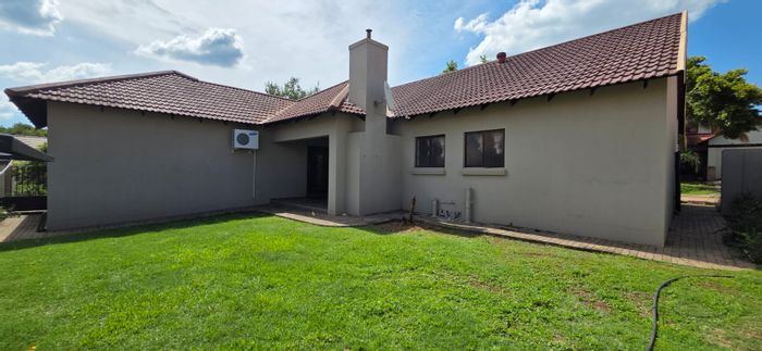 House To Rent in Melodie: 3 bedrooms, double garage, private garden, secure complex.