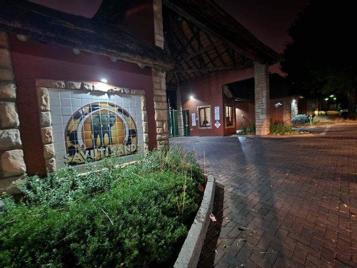 For Sale: Sunninghill Townhouse with 2 bedrooms, loft, patios, and pet-friendly amenities.