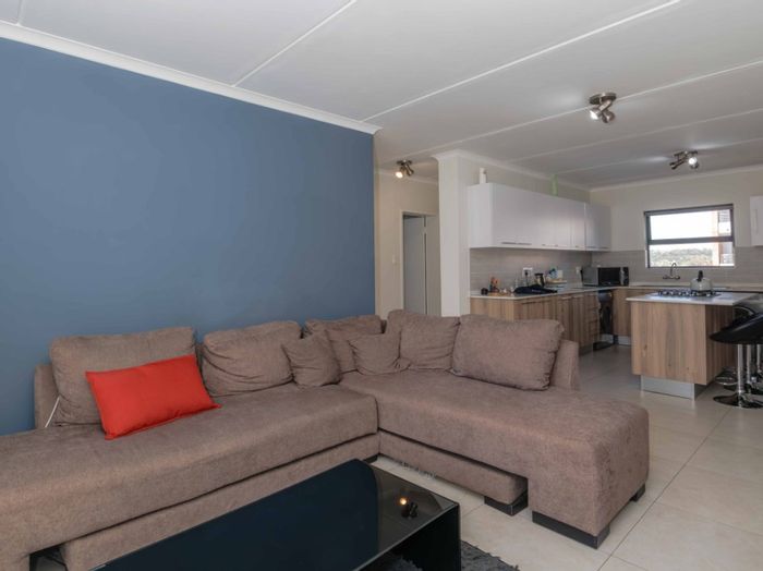 For Sale: 2-Bedroom Townhouse in Modderfontein with pool, braai area, and pet-friendly.