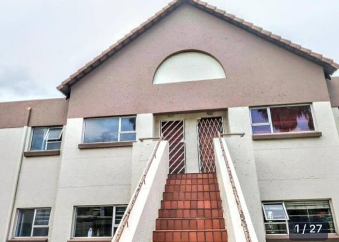 1-Bedroom Townhouse For Sale in Bedford Gardens with pool, clubhouse, and storage.