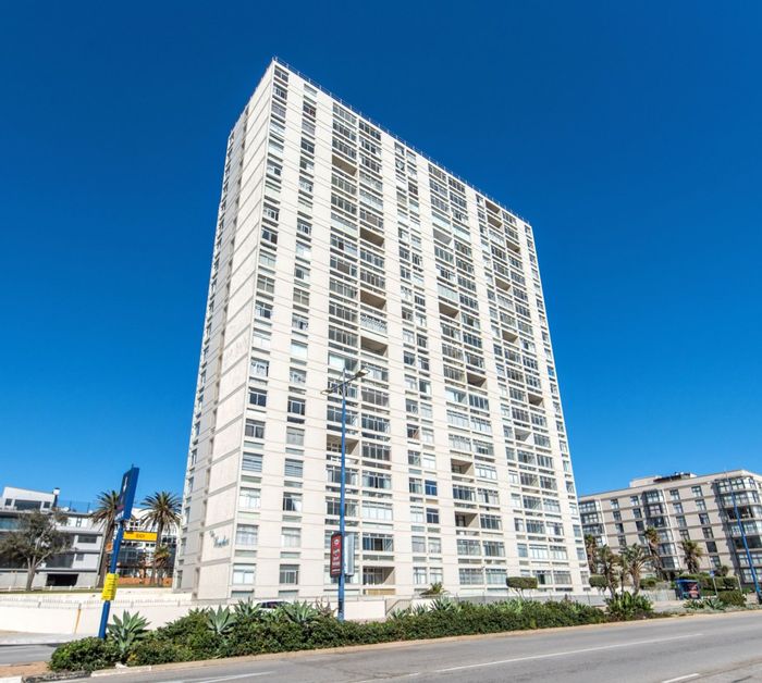 Beachfront Apartment in Humewood For Sale: 2 Bedrooms, Secure Parking, Renovated Kitchen.