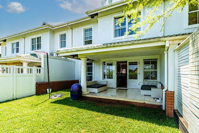 Townhouse To Rent in Mount Edgecombe Country Club Estate with 3 bedrooms, garage.