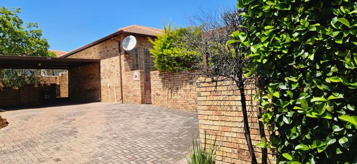 For Sale: 3-Bedroom Townhouse in Bellairs Park with private garden and secure parking.