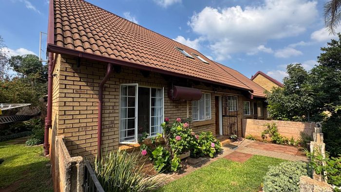 3-Bedroom Townhouse To Rent in Hennopspark with garden, lapa, and garage.