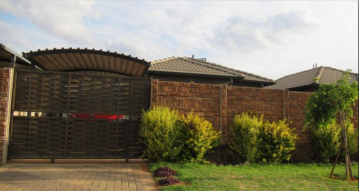 Secure 2-Bedroom House for Sale in Protea Glen with Modern Kitchen and Carport.