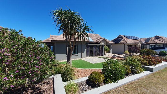 For Sale: House in Dana Bay with 2 beds, patios, garden, secure estate.