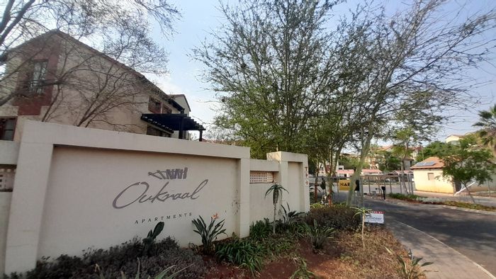 For Sale: Apartment in Hazeldean with security, pool, gardens, and parking.