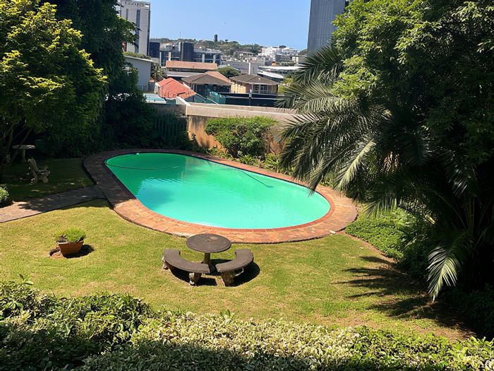 For Sale: 2-bedroom apartment in Musgrave with pool, gardens, and secure parking.