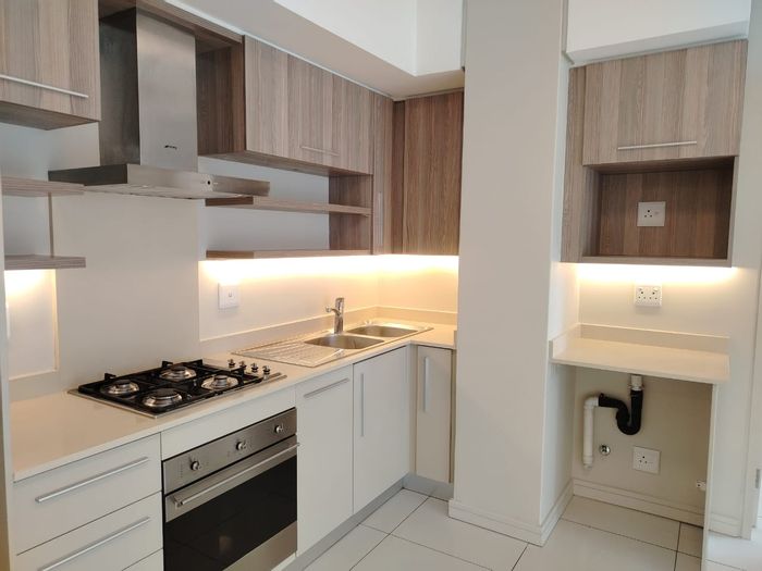 For Sale: Rosebank Apartment with 2 beds, balcony, concierge, and secure parking.