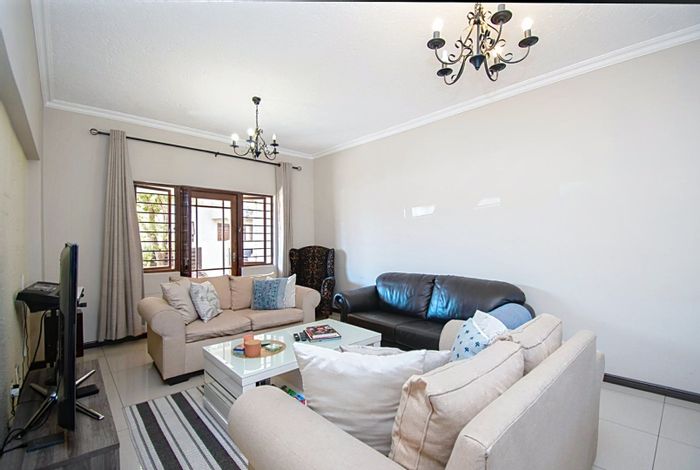 For Sale: 2-Bedroom Apartment in Paulshof with Private Garden and Pool Access.