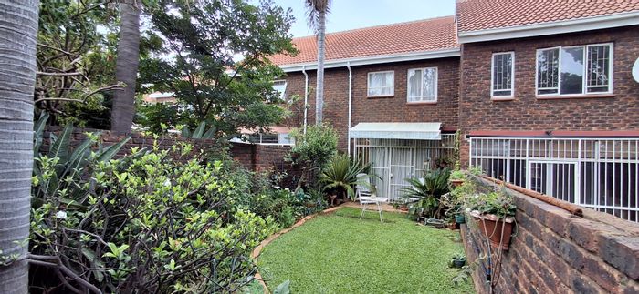Townhouse for Sale in Garsfontein: 2 beds, private garden, 24-hour security.