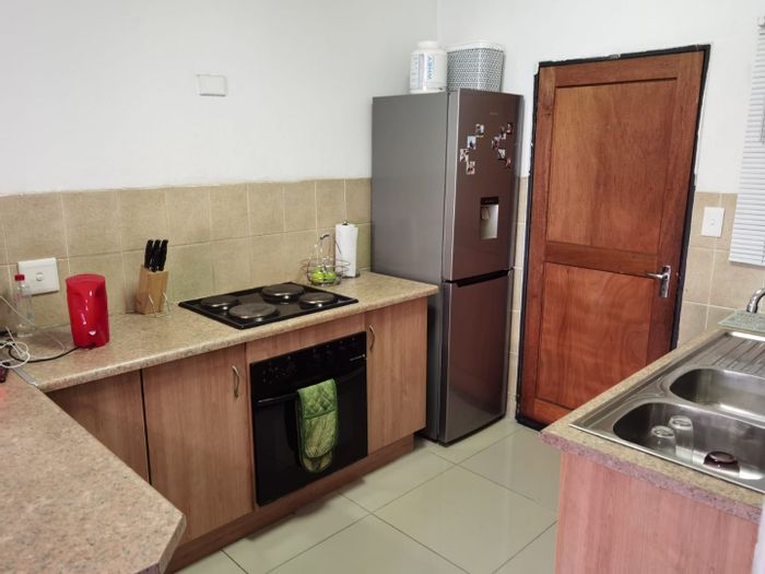For Sale: 2-Bedroom Apartment in Elspark with security, parking, and prepaid electricity.