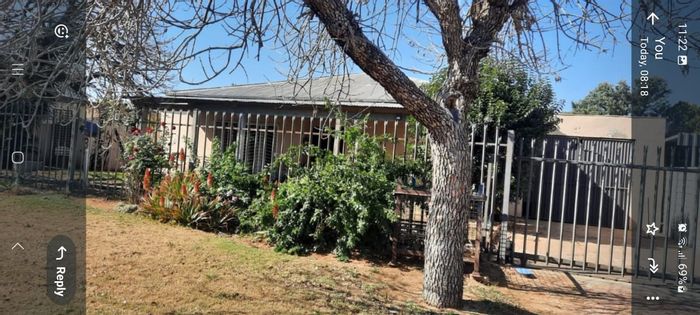 For Sale: Spacious 4-Bedroom House in Odendaalsrus Central, near schools and shops.