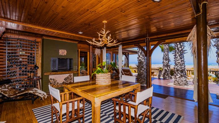 Beachfront House in Melkbosstrand Central For Sale: 3 beds, outdoor shower, direct beach access.