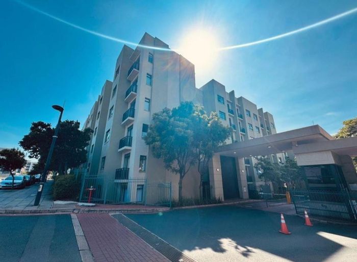 For Sale: Apartment in New Town Centre with secure access, pool, and workspace.