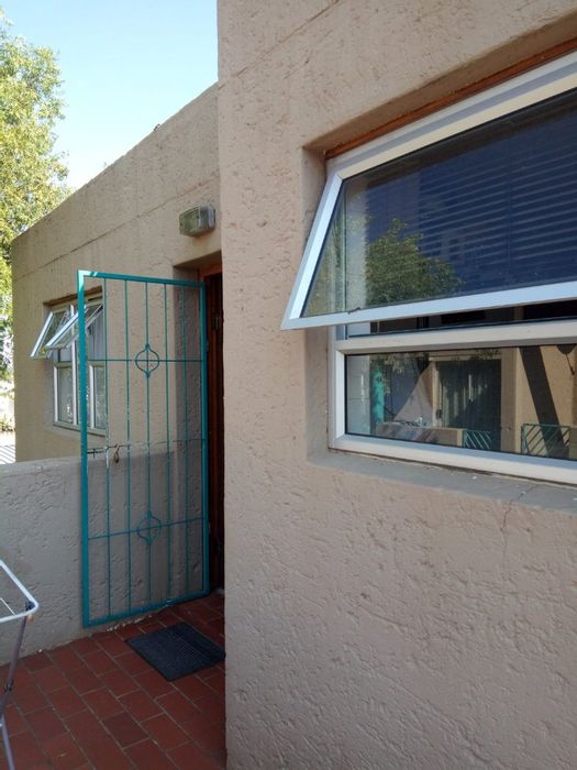 For Sale: Fauna Townhouse with 2 bedrooms, secure parking, communal garden access.