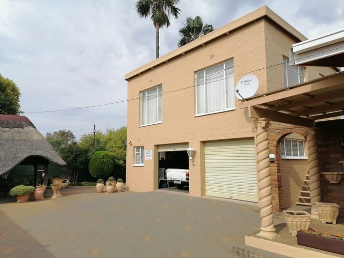 For Sale: Spacious 4 Bedroom House in Hennenman Central with Double Garage and Boreholes.