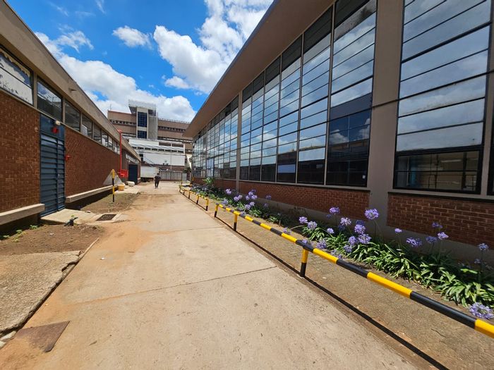 Industrial Warehouse for Sale in Koedoespoort: 3-phase power, offices, loading bays.