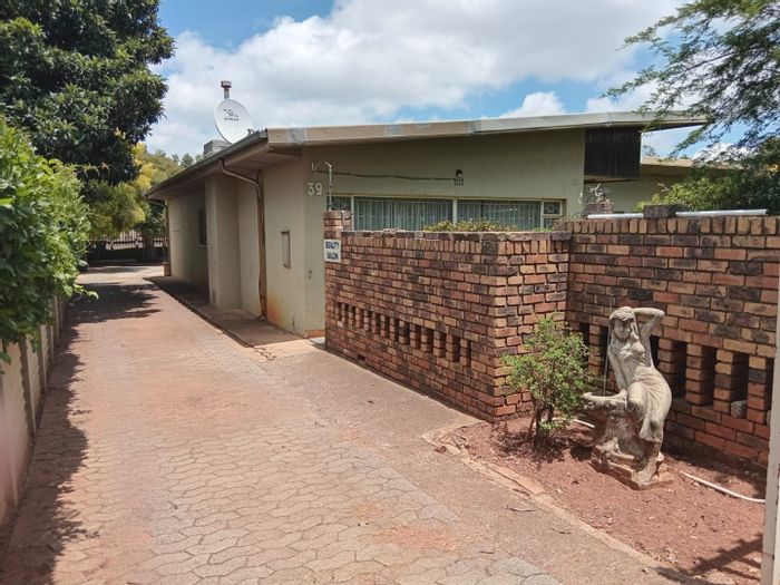For Sale: House in Krugersdorp North with 4 beds, granny flat, and lapa.
