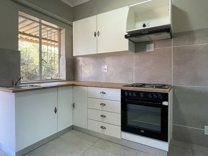 3-Bedroom Apartment in Wilkoppies For Sale, with garage and rental income potential.