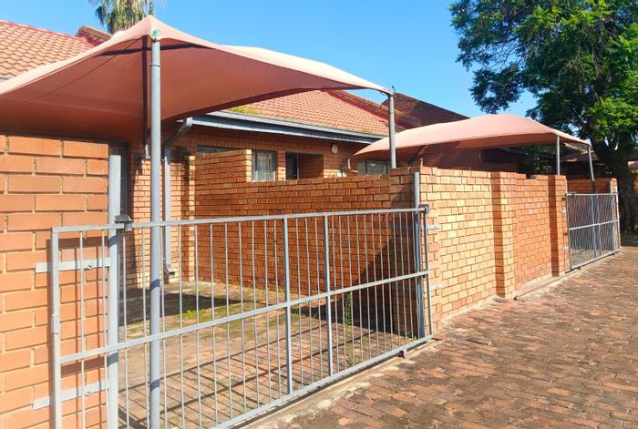 For Sale: Townhouse in Annadale with open-plan living, carport, and outdoor space.