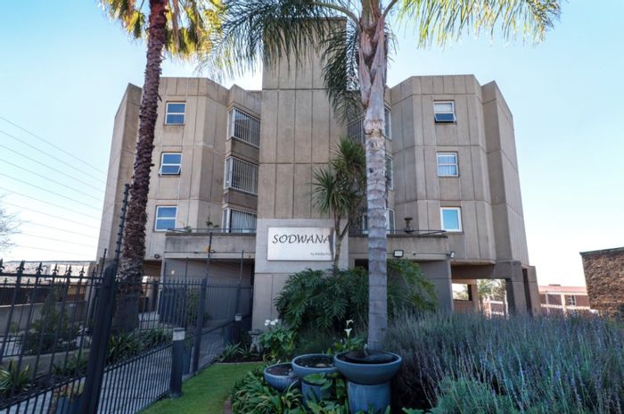 Spacious 2-bedroom apartment in Primrose Hill with study, carport, and security. For Sale.