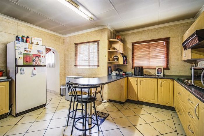 For Sale: House in Van Riebeeck Park with pool, study, and staff quarters.
