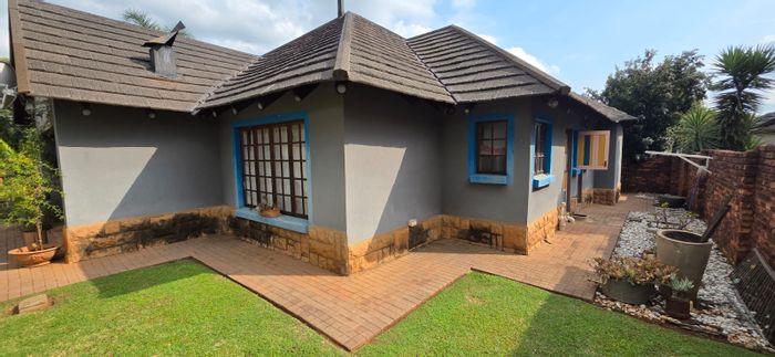 For Sale: House in Melodie with 3 bedrooms, double garage, and covered braai room.