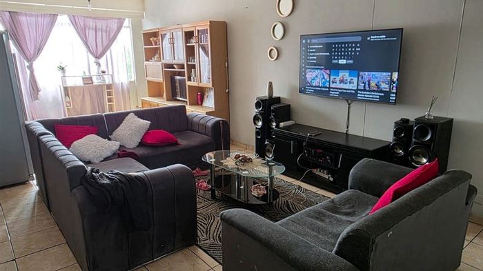 For Sale: Apartment in Kempton Park Central with 2 bedrooms, secure parking, and functional layout.