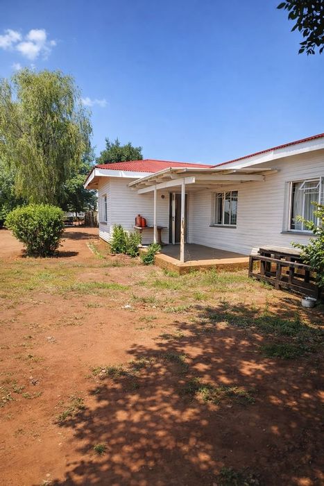 3-Bedroom House in Orkney Central For Sale with Large Yard and Outbuildings.
