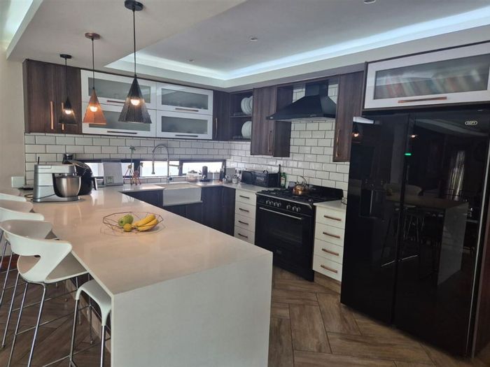 For Sale: House in Glen Eagle Estate with pool, staff quarters, and dual garages.