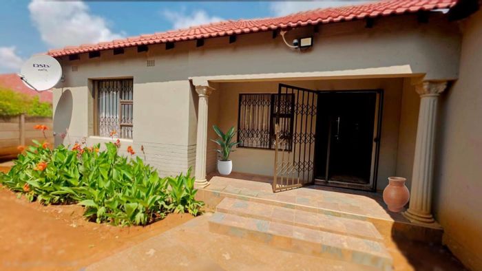 For Sale: House in Stilfontein Ext 1 with 3 beds, security, and spacious garage.