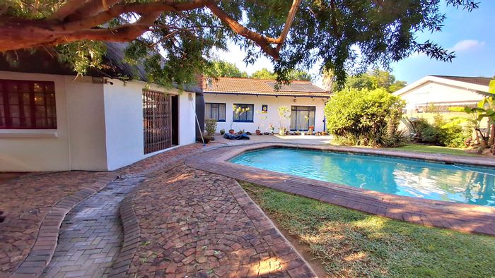 For Sale: Spacious 4-bedroom house with flatlet, pool, and double garage in Sasolburg Ext 3.