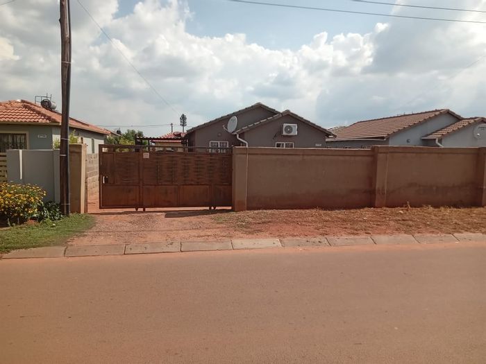 3-Bedroom House For Sale in Protea Glen with spacious yard and secure parking.