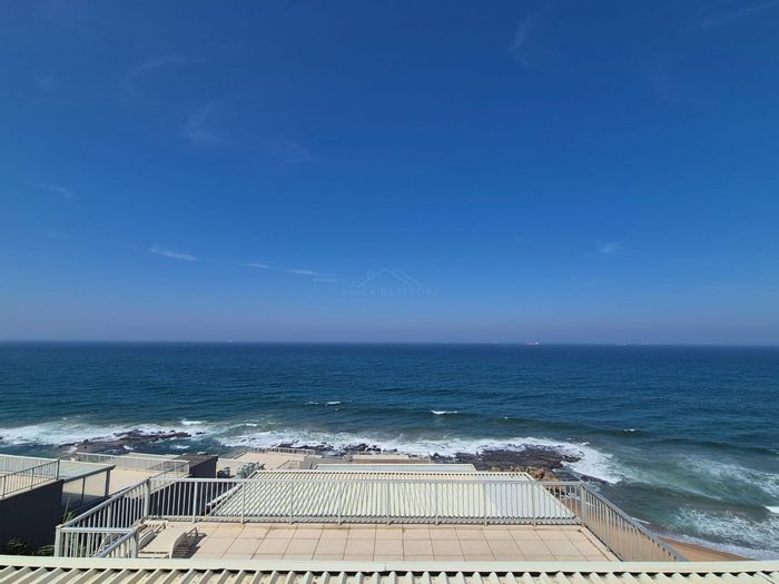 For Sale: Umdloti Beach Apartment, 3 beds, ocean views, vacation rental income potential.