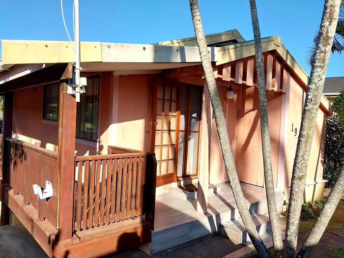 For Sale: 4-Bedroom Townhouse in Hibberdene Central with security, pool, and garage.