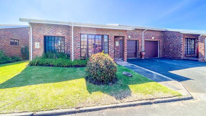 Gonubie Townhouse For Sale: Secure estate, private courtyard, garden, and garage.