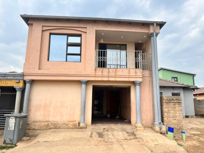 For Sale: Clayville House with bachelor units, garage, and efficient space utilization.