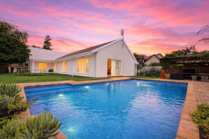 For Sale: House in Parkrand with pool, garden, and ample parking spaces.