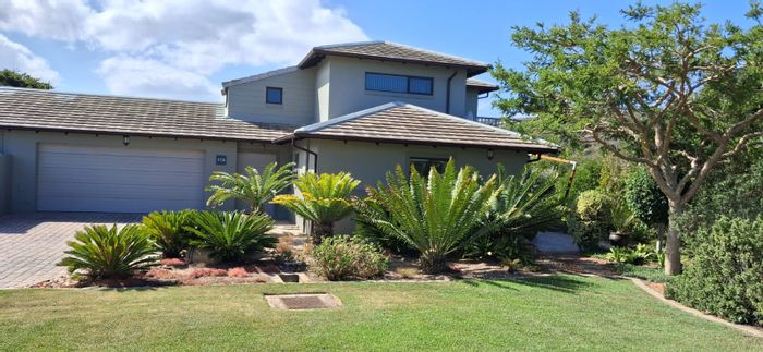 House for Sale in Hartenbos Landgoed: Gourmet kitchen, indoor braai, secure estate living.