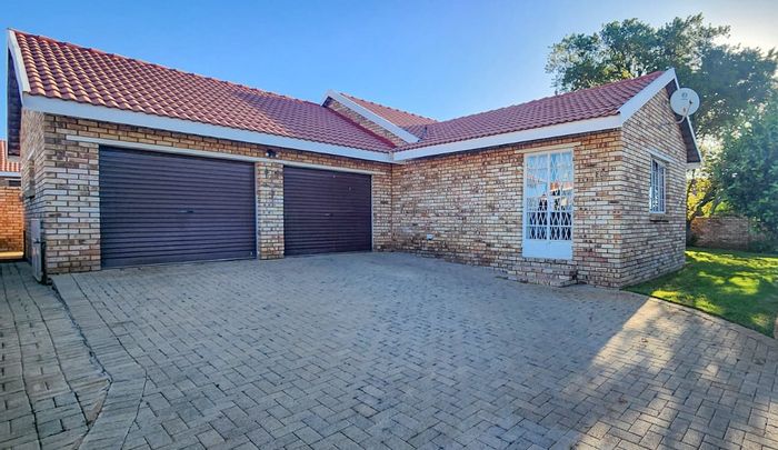 For Sale: Townhouse in Meiringspark with garden, braai, double garage, and pre-paid electricity.
