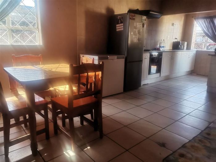 For Sale: Spacious 4-Bedroom House in Geduld Ext 1 with Dual Kitchens.