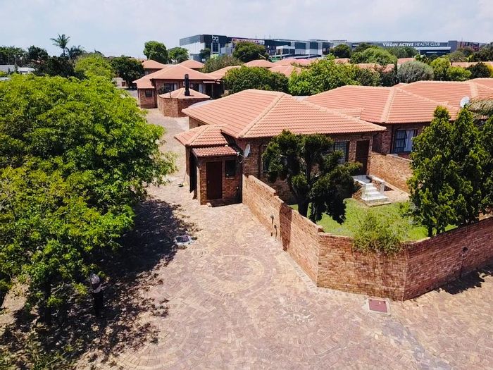 For Sale: 3-Bedroom Townhouse in North Riding with pools, security, and garden retreat.