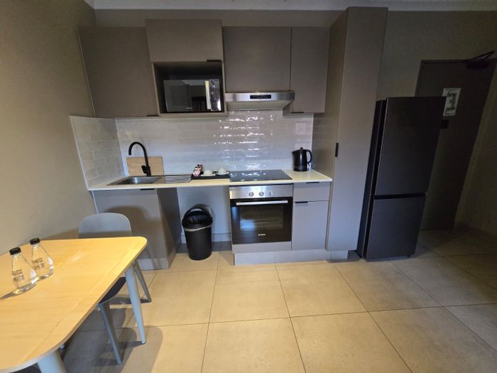 1-Bedroom Apartment To Rent in Bedfordview Central with amenities like gym, café, and security.