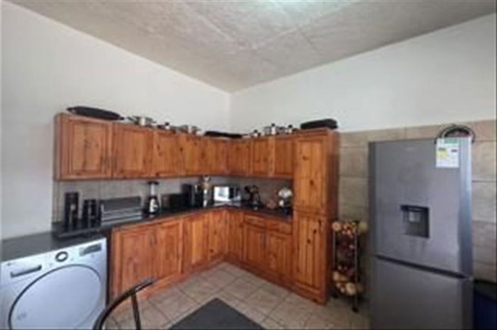 For Sale: Apartment in Cruywagen Park with 2 bedrooms, secure parking, and efficient layout.