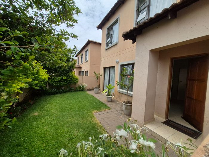 For Sale: Spacious Montana Park townhouse with private garden, double garage, and three bedrooms.