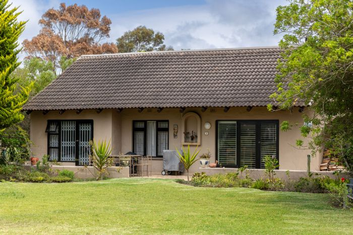 Keurbooms River House For Sale: 3 beds, pool, solar power, communal wildlife.