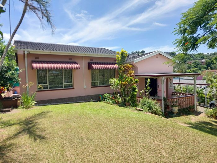 For Sale: Spacious 4-bedroom house in Stanger Heights with growth potential and ample parking.
