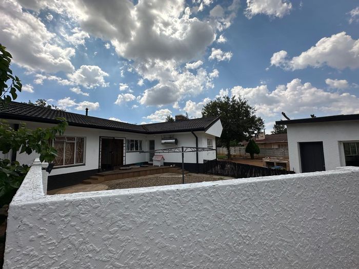 House for Sale in Wolmaransstad Central: 3 beds, solar system, security features.
