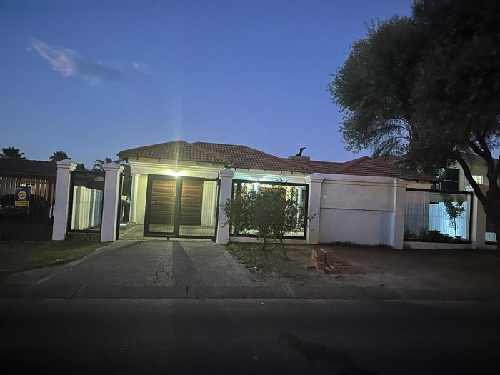 For Sale: Spacious Montana house with 4 bedrooms, garage, patio, and security features.